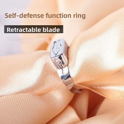 Self-defense opening ring with hidden blade